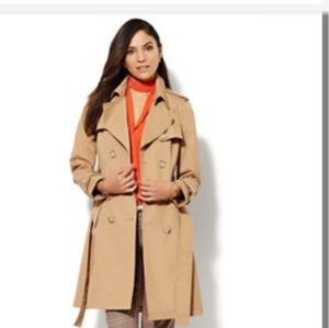 Double breasted tan trench coat